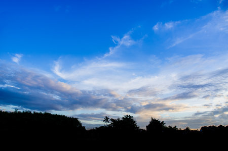 vivid blue sky with cloudsの写真素材