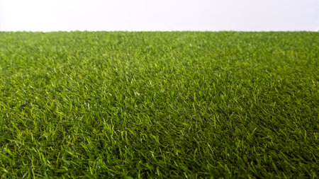 artificial grass. green field background.look freshness decorated wallpaper