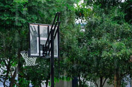 raining in basketball fieldの写真素材