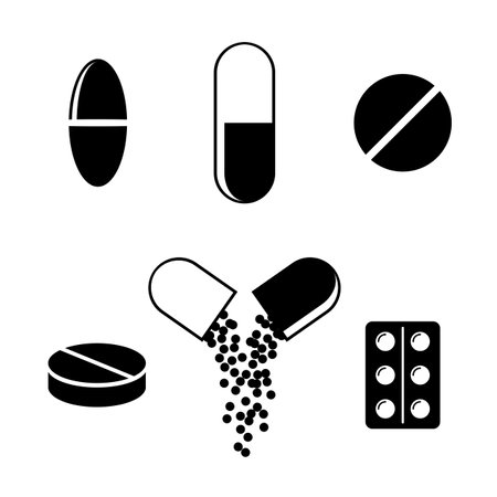 Set of pills and capsules icons on a white background. Medicines icons. Blister pills: pain relievers, vitamins, antibiotics and aspirin. Pharmacy and drugs symbols. Medical vector illustrationのイラスト素材