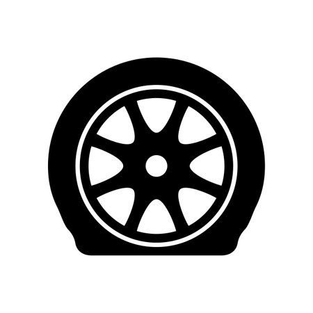 Flat tire icon. Deflated automobile tire. Punctured wheel of car. Tire service station garage. Vector illustrationのイラスト素材