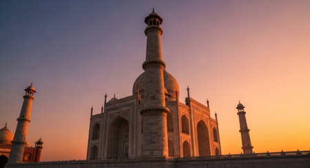 Taj mahal at sunrise: stunning architecture and warm glowの素材