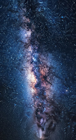 Stunning view of the milky way galaxy's vibrant colors and starry night skyの素材