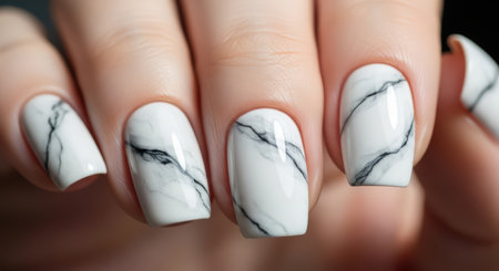 Elegant marble nail art design on short manicured nailsの素材
