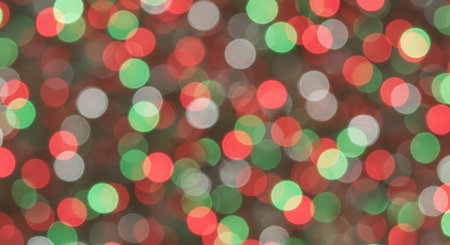 Festive red and green bokeh lights sparkle in soft focusの素材