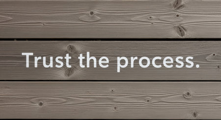 Trust the process text on wooden background with natural grain detailsの素材
