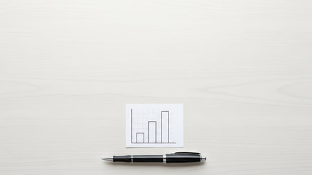 Business growth chart and pen on minimalist white desk background.の素材