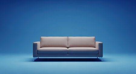 Modern beige sofa on minimalistic blue backgroundの素材