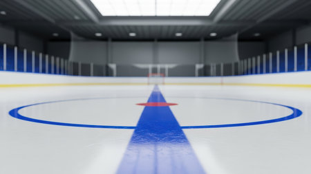 Empty indoor ice rink with blue lines and goal net in focus.の素材
