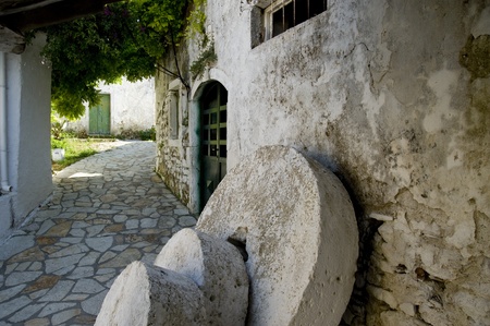   alley in a typical village on the island of Korfu in Greeceの写真素材