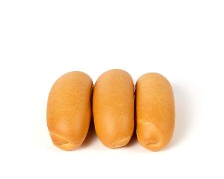 Three hot dog buns isolated over white