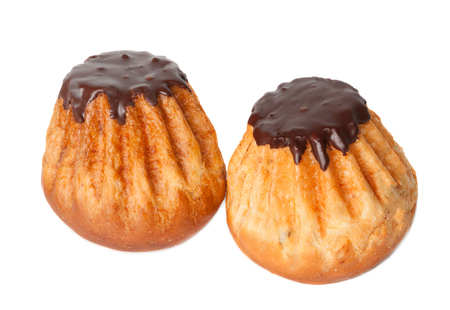 Two chocolate glazed buns isolated over whiteの写真素材