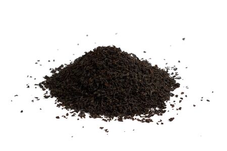 Heap of black tea isolated on white backgroundの写真素材