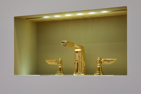 Gold egyptian style mixer in the store windowのeditorial素材