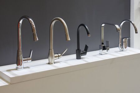 Five mixers for bathroom in the storeの写真素材