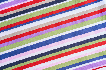 Textile multicolored stripes fabric as a background