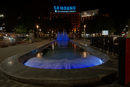 Belgrade, Serbia - May 04, 2018: Blue light illuminated fountain at Trg Nikole Pasica square at nightのeditorial素材