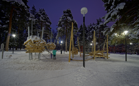 Winter night view of the playground in Pestovskiy park in Zheleznodorozhniy, Moscow oblast (region), Russia.の写真素材