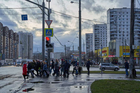 Moscow, Russia - March 13, 2020: Pedestrians cross road near Babushkinskaya metro stationのeditorial素材