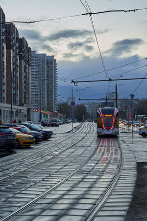 Moscow, Russia - March 13, 2020: Modern tram goes on Menzhinskogo street