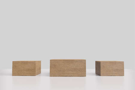 Wooden pedestal display with box stand concept. Podium for brand promotion products, realistic 3d digital renderingの写真素材