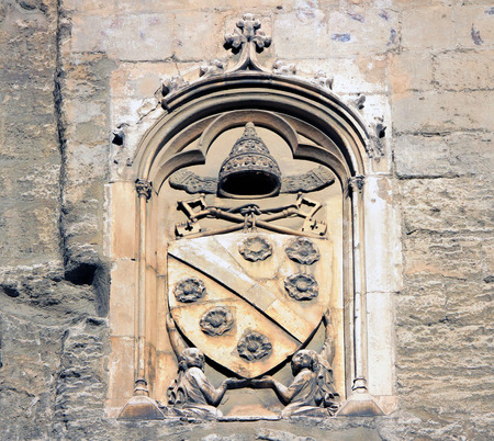 Papal Emblem at the entrance to the Popes Palace  Palais de Papes , Avignon, France