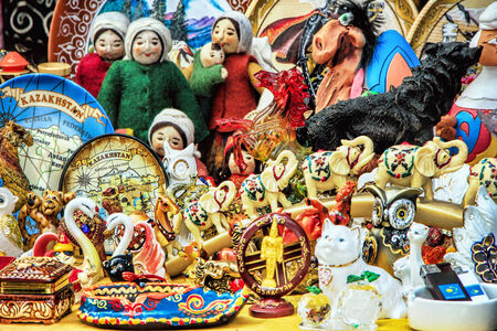 ALMATY, KAZAKHSTAN - MARCH 10, 2014: Colorful souvenirs in market in Kok-tobe park, Almaty, Kazakhstan on March 10, 2014のeditorial素材