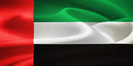 flag of the United Arab Emirates  waving in the wind. Silk texture patternの写真素材