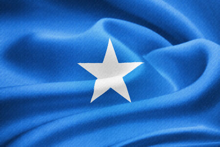 Flag of Somalia waving in the wind. Silk texture patternの写真素材