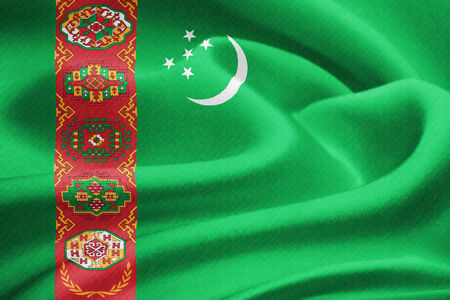 Flag of Turkmenistan waving in the wind. Silk texture patternの写真素材