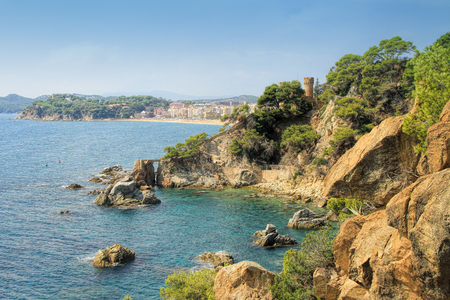LLORET DE MAR, SPAIN - September 14, 2014: Seaside with Sant Joan castle in Lloret de Mar, Costa Brava, Catalonia, Spainのeditorial素材