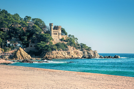 LLORET DE MAR, SPAIN - January 01, 2015: Seaside with Sant Joan castle in Lloret de Mar, Costa Brava, Catalonia, Spainのeditorial素材