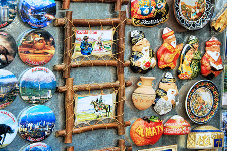 ALMATY, KAZAKHSTAN - MARCH 10, 2014: Colorful magnet souvenirs in market in Kok-tobe park, Almaty, Kazakhstan on March 10, 2014のeditorial素材