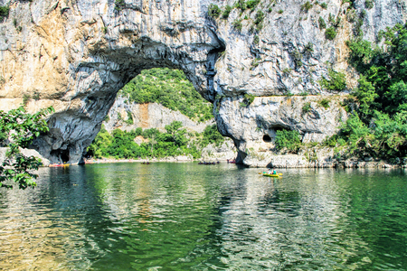 Vallon Pont d'Arc, Natural Rock bridge over the River in the Ardeche Canyon, southern France.の写真素材