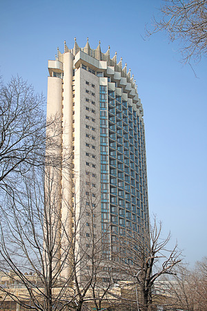 ALMATY, KAZAKHSTAN - FEBRUARY 16, 2014: Kazakhstan Hotel in Almaty, Kazakhstan. Kazakhstan Hotel was built in 1970 to make an earthquake 9.0 on the Richter scale. It is a famous landmark all over Almaty, and serves as a symbol of the city.のeditorial素材