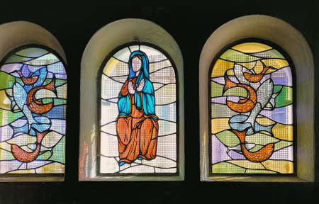 SETE, France âMarch, 16, 2019: Stained glass window in the Church at the mount Saint Claire, Sete, South of Franceのeditorial素材