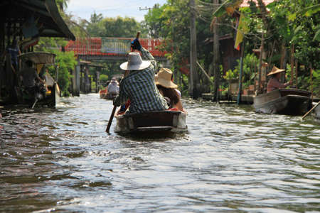 Famous floating market in Thailand, Damnoen Saduak Floating Market, tourists visiting by boat, Ratchaburi, Thailand.のeditorial素材