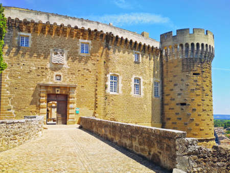 Suze-la-Rousse, France, - July, 16, 2019: Church of Suze-la-Rousse with the Wine university at the vackground, Drome Department, Rhone-Alpes, Franceのeditorial素材