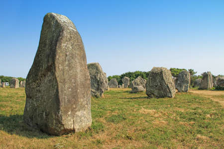 Carnac (Karnag) Stonesâ the largest megalithic site in the world consisting of alignments, dolmens, tumuli and single menhirs around the village of Carnac in Brittany, Franceの写真素材
