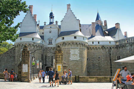 Nantes, France - August, 18, 2018: View on the castle of Dukes of Brittany with tourists in Nantes city in Franceのeditorial素材