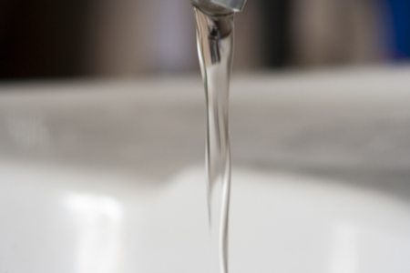 close-up tap waterの写真素材