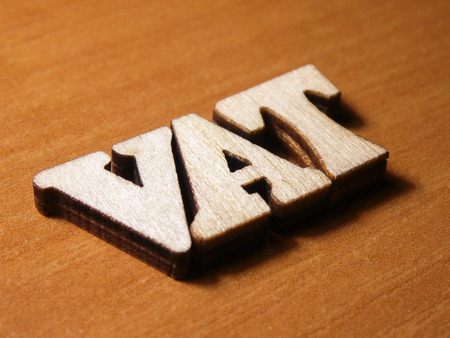The word vat written with wooden letters backgroundの写真素材