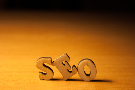 The word seo written with wooden letters backgroundの写真素材