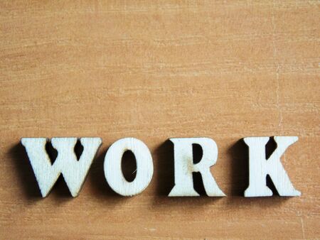 The word 'work' made of wooden letters. wood inscription