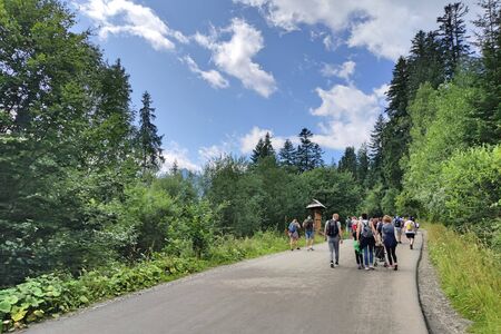 Crowds of people on their way to the sea eye in the Tatras. The biggest attraction for people in the Polish mountainsの写真素材