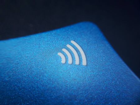 Contactless credit card sign close-up, soft focus.の写真素材