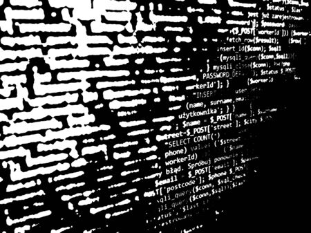 Abstract white code on black background. Code on monitor. Software development coding. Digital background.の写真素材