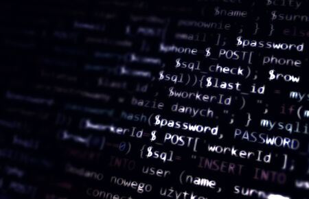 Black white abstract computer code. White programming code on black background. Cyberspace concept.の写真素材