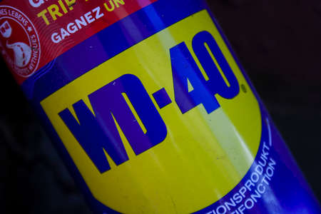 Krakow, Poland - June 16, 2020: WD-40 logo multifunctional spray bottle close-up.のeditorial素材
