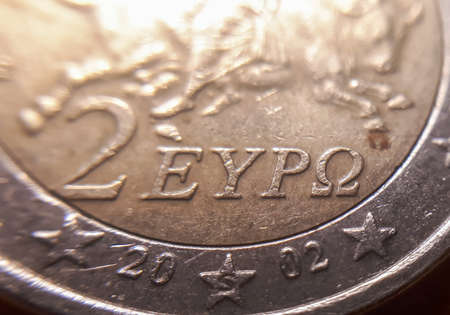 Macro 2 Euro coin. Extreme close up of a Greek two euro coin.